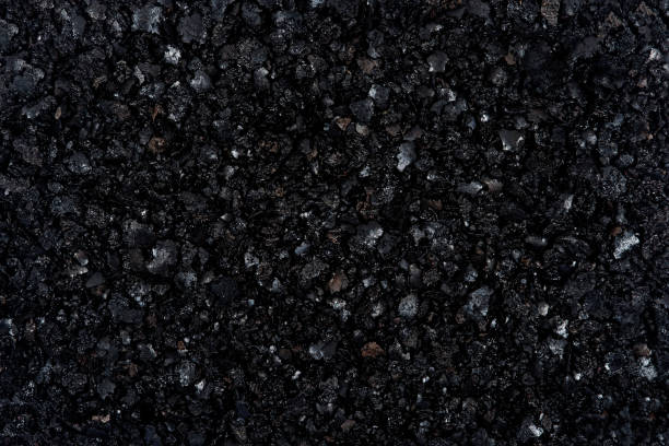 istock Top view of black textured abstract background. 1352685702