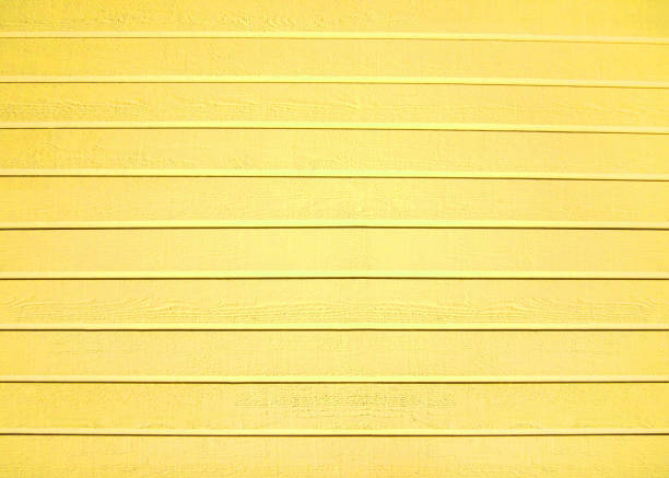 istock Yellow wood color texture horizontal for background. Surface light clean of table top view. Natural patterns for design art work and interior or exterior. Grunge old white wood board wall pattern 1352685810