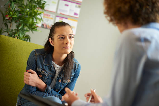 istock young woman in counselling session 1352688499