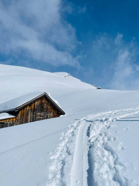 istock Mountain hut on a high mountain ridge 1352689658