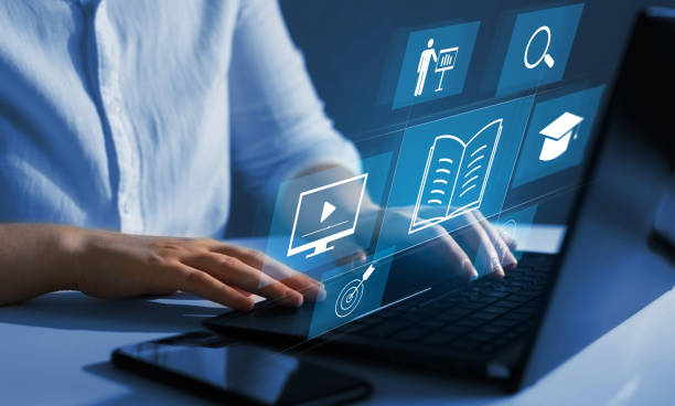 istock E-learning education and internet lessons. Education on internet Technology. Person who attends online lessons on a digital screen. 1352690186