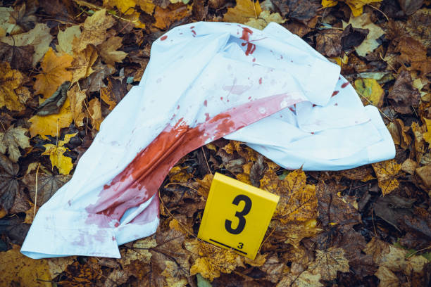Crime scene Shirt with blood at crime scene evidence photos stock pictures, royalty-free photos & images