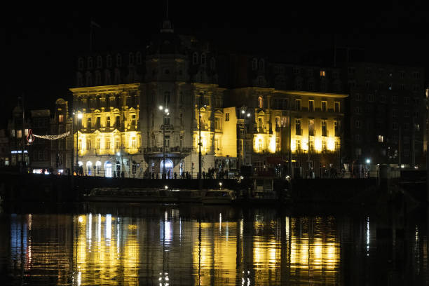 istock amsterdam canal at night view 1352695846