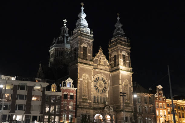 istock amsterdam canal at night view 1352695852