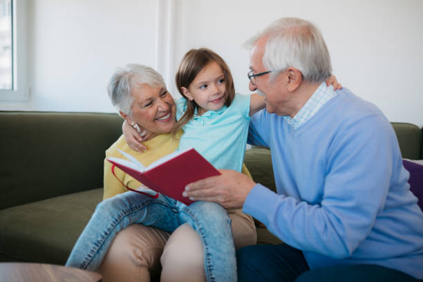 istock Grandparents having fun with granddauther 1352698359