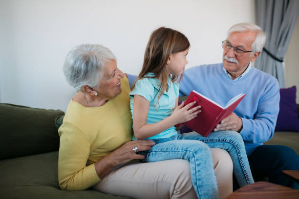 istock Retiress learning with granddauther 1352698368