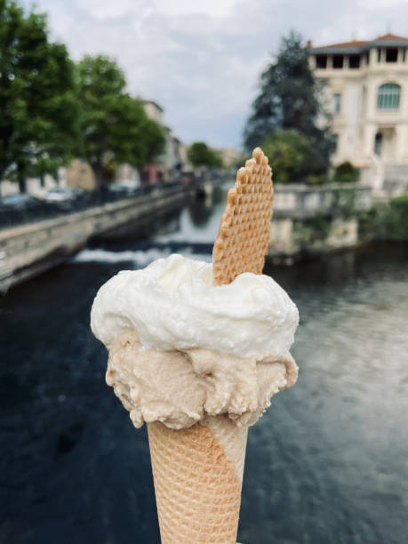Double scoop ice-cream cone with wafer on top