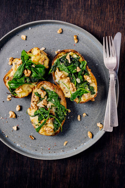 istock Stuffed Potato Skins with Spinacha and Gorgonzola Cheese 1352702116