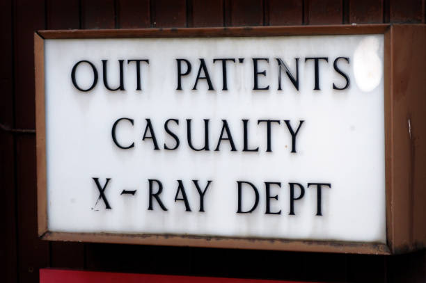 istock Old Sign at a former hospital. 1352704915
