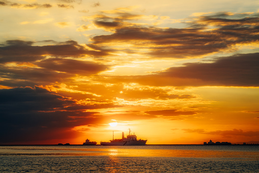 Manila Bay with Ship at Sunset in the Philippines