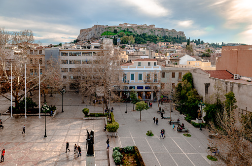 Athens, Greece - March 9 2019: View of the Mitropoleos Square from above, with the historic neighbourhood of Plaka and the Acropolis of Athens in the background.