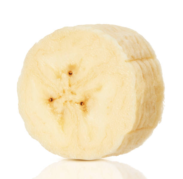 istock Slice of banana isolated on white background 1352707857