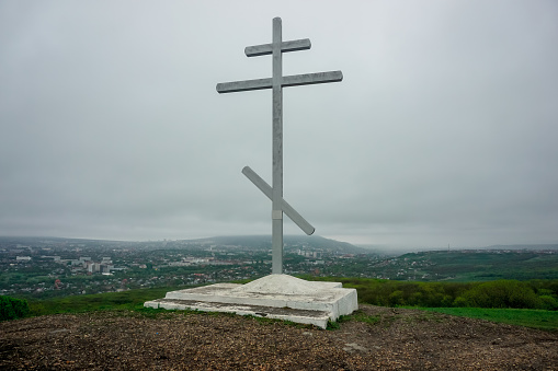 Large Orthodox cross on the top of the mountain