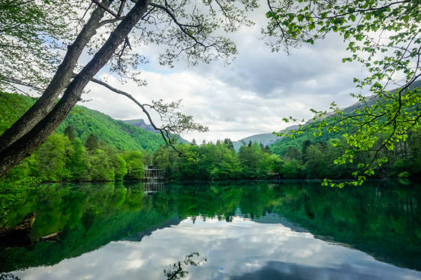 istock Mountain lake with reflection in the Caucasus 1352708666