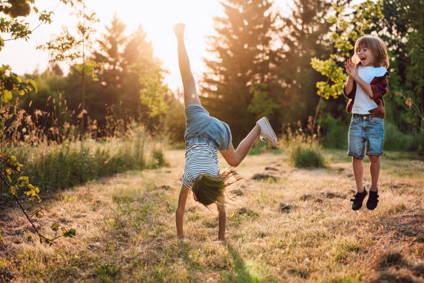 istock Happy Kids having fun in the nature. 1352711666