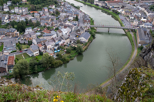 Aerial view of a town in the Ardennes crossed by the Meuse River in France