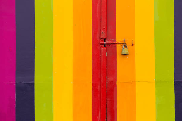 istock Colorful padlocked wooden door 1352712061