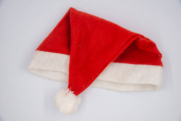 istock Santa Claus red hat isolated on white background 1352713383