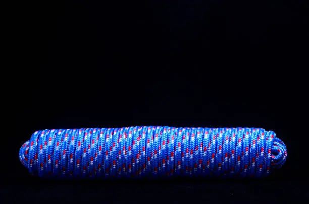 Twisted Roll of Rope On a Black Background