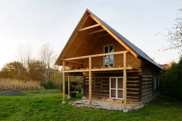 istock Reconstruction of old house construction 1352716114