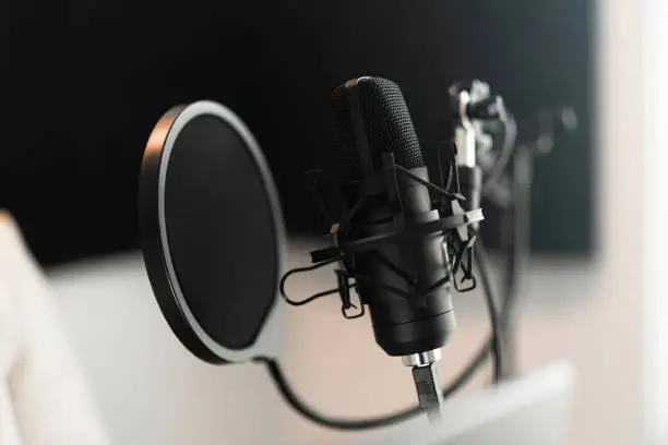 Photo of Microphone in a podcasting studio