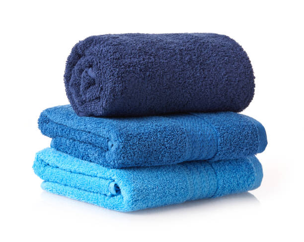istock Blue bathroom towels on white background 1352720304