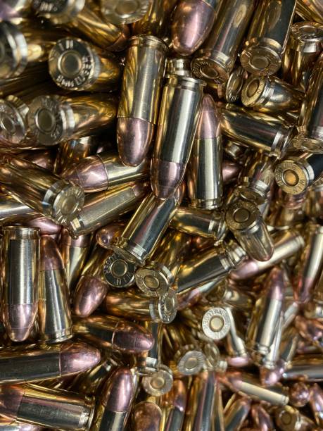 istock 9mm and 22 calibre bullets close up for practice shooting at a firearm range 1352726612