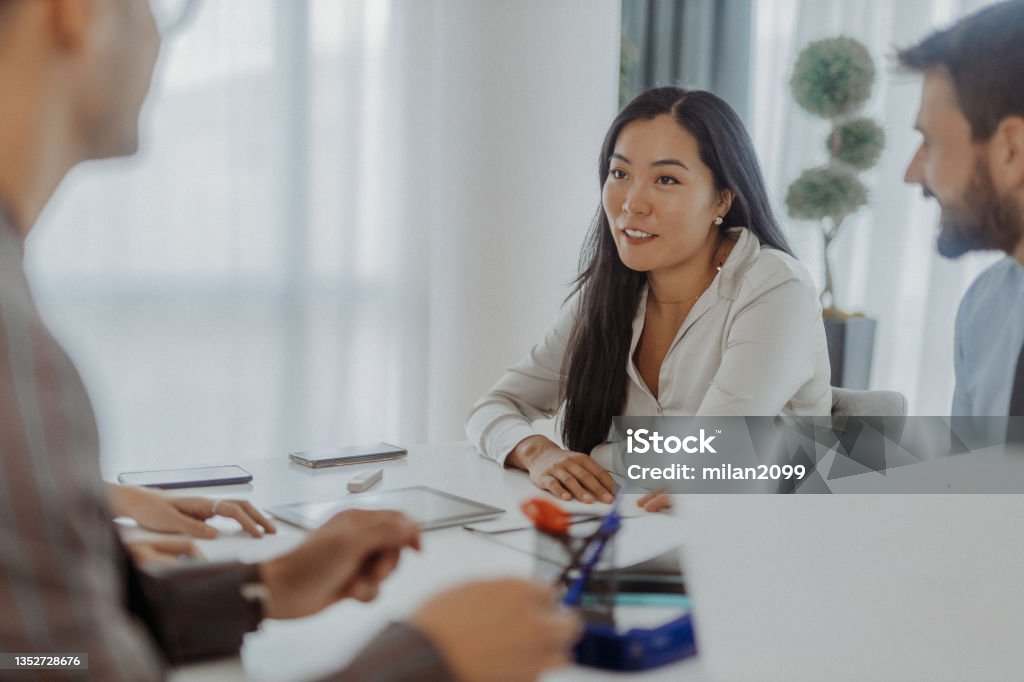 Working in the office Group of people in the office Meeting Stock Photo