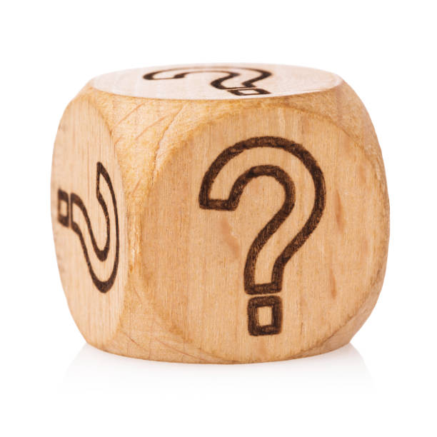 istock Wooden cube with question mark symbol isolated on white background 1352729883