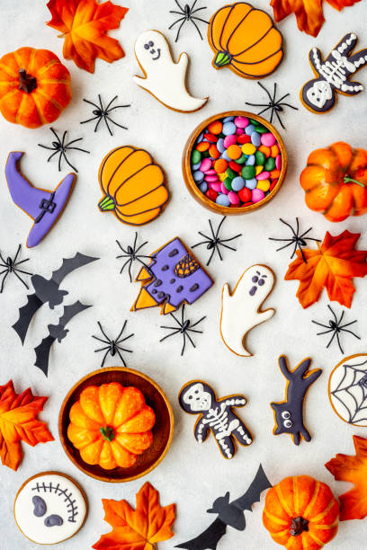 istock Halloween party background - cookies with pampkins 1352729889