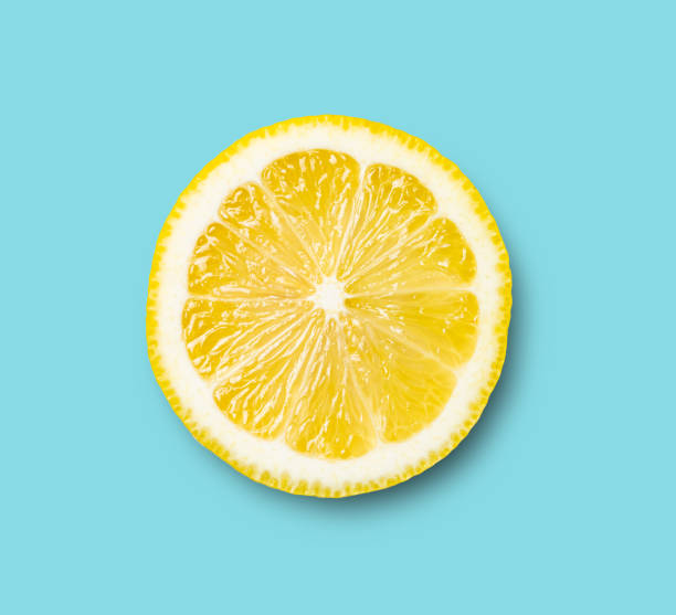 istock Fresh sliced lemon  poster on blue background. Top view, copy space and macro. Concept healthy and vegan image 1352729977