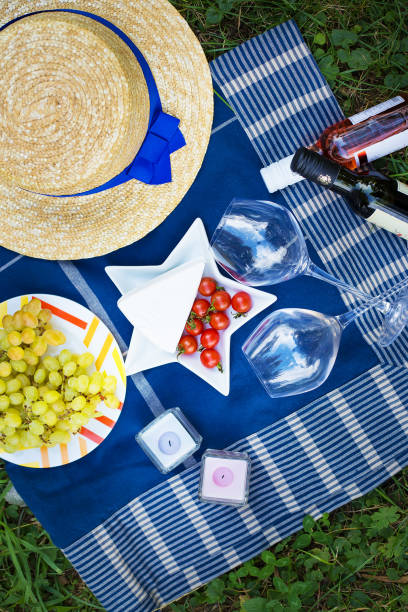 istock warm summer weekend, bright camping, picnic serving 1352730691