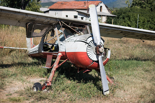 Close up shot of an abandoned vintage airplane.