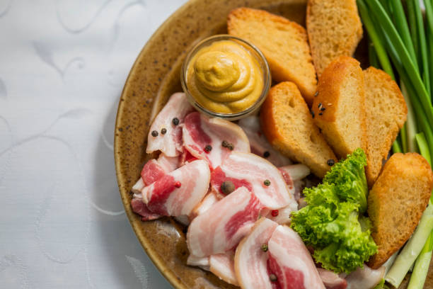 istock Food plate with chopped bacon Salo 1352735372