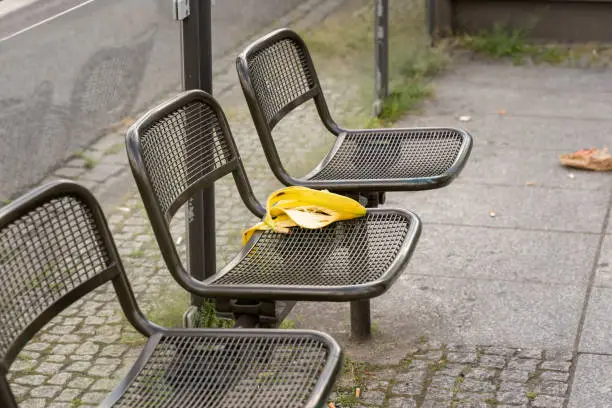 Photo of Banana Peel Waste on a Seat at a Public Bus Stop