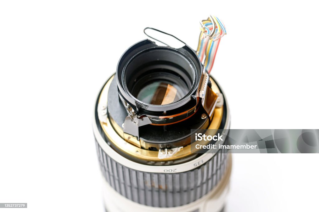 Damaged photo lens, 70-200, background with copy space Damaged photo lens 70-200, background with copy space, full frame horizontal composition Alloy Stock Photo