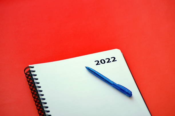 istock on the table is a notebook and a pen for records for 2022 1352738163