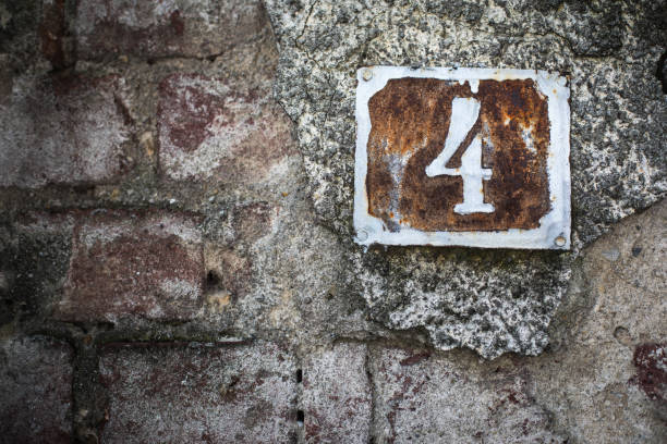 istock Number 4 plaque on a house wall 1352738668