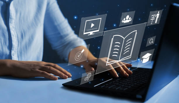 istock E-learning education and internet lessons. Education on internet Technology. Person who attends online lessons on a digital screen. 1352741937