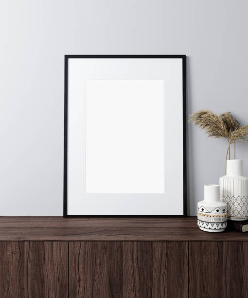 istock mock up poster frame in modern interior background, Scandinavian style, 3D rendering 1352743110