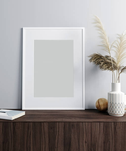 istock mock up poster frame in modern interior background, Scandinavian style, 3D rendering 1352743111