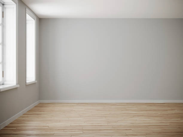 istock Empty room for mockup. Empty roon with light wall and wooden floor.3d rendering 1352743120