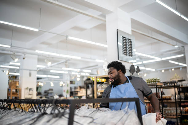 istock Salesman organizing products at a decoration store 1352746553