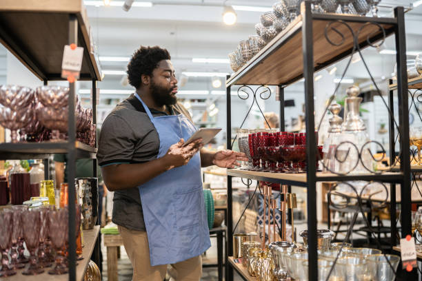 istock Salesman checking out products at a decoration store 1352747165