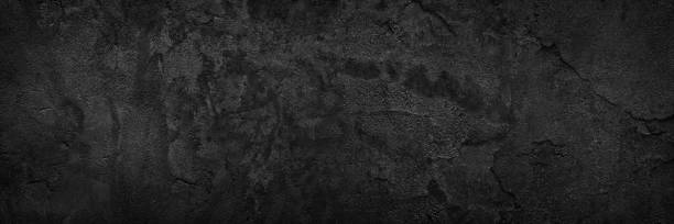 istock vintage dark gray rough cement plaster as background or web banner. Panorama 1352747505