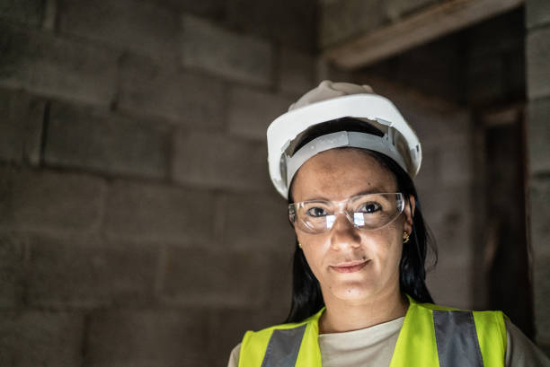 istock Portrait of a female engineer in a construction site 1352748884