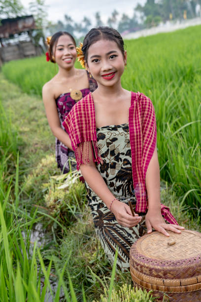 istock Young local people in the rice fields 1352750836