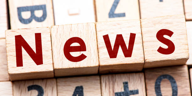 istock Word NEWS arranged from wooden letters. 1352752059