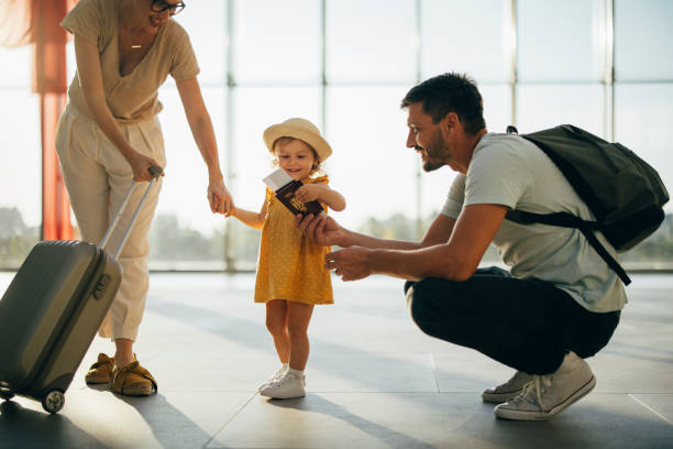 istock Young Family Having Fun Traveling Together 1352753081
