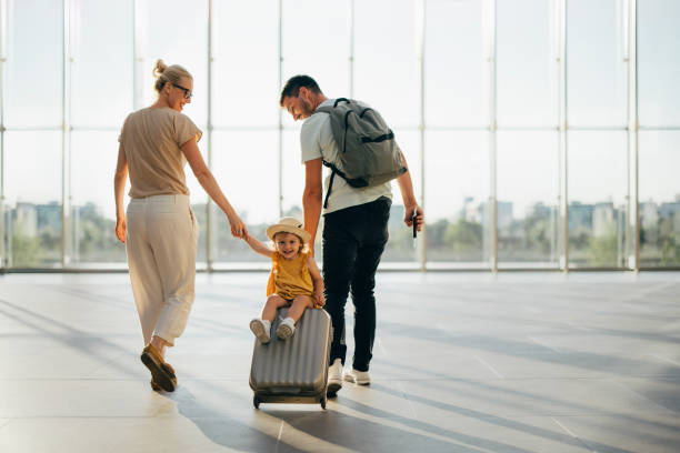 istock Young Family Having Fun Traveling Together 1352753082